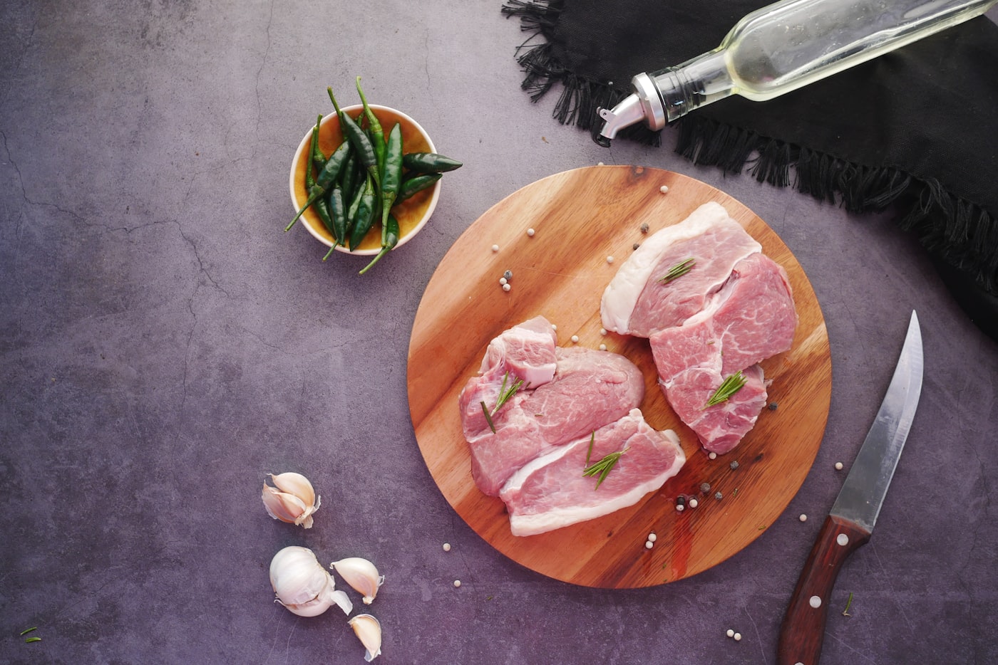 Fresh raw pork cuts on a board